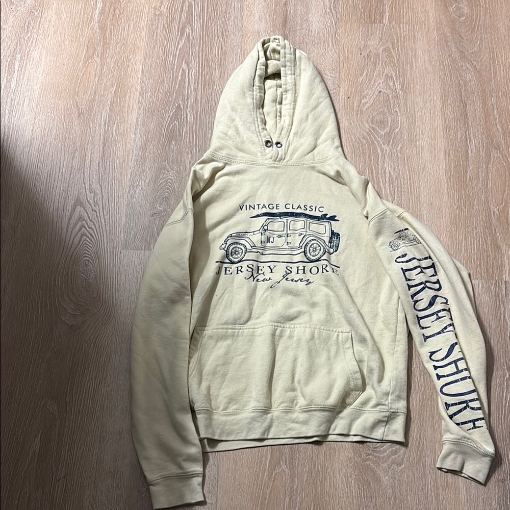 Cream Pullover Hoodie with Sleeve Graphics